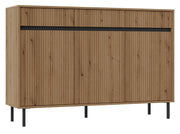 Drehtür-Kommode Osaka mit drei Schubladen und gerillten Fronten, 149 cm, Eiche Evoke auf schwarzen Beinen