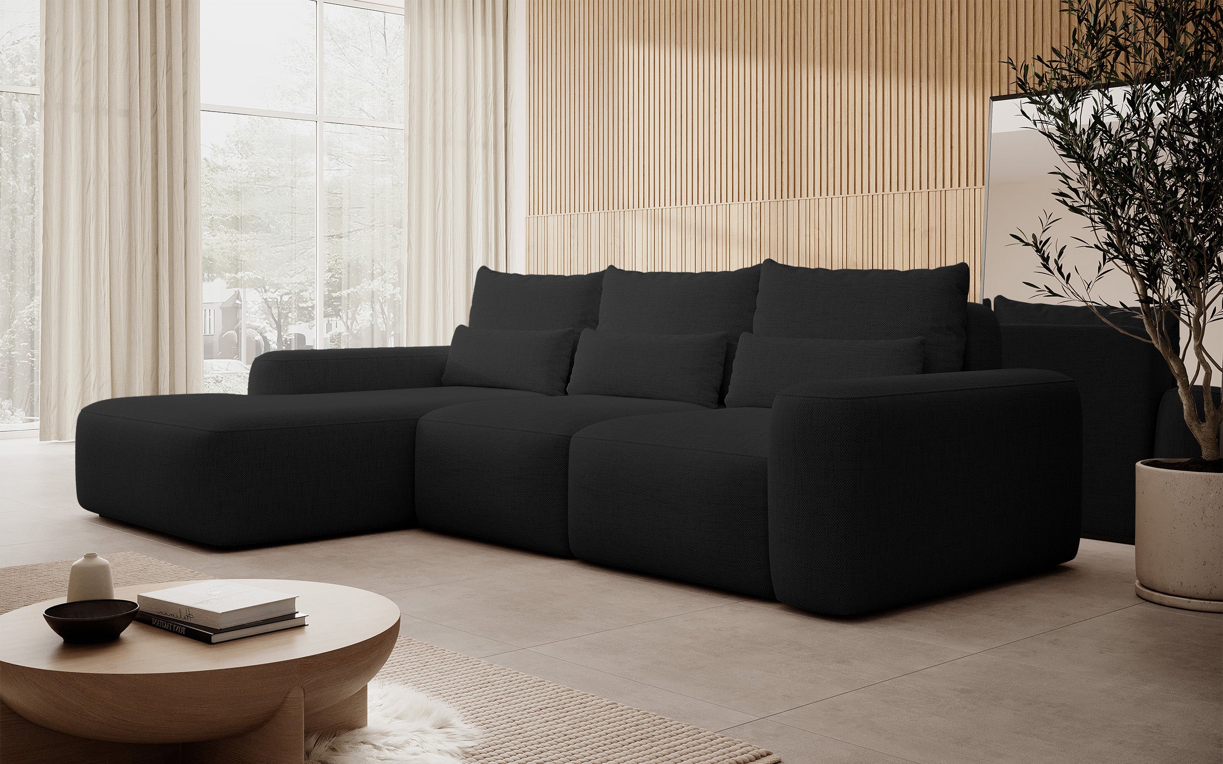 Ecksofa mit Schlafunktion Carnos, L-förmig, mit zusätzlichen Lendenkissen, schwarzer hydrophober Chenille, linksseitig