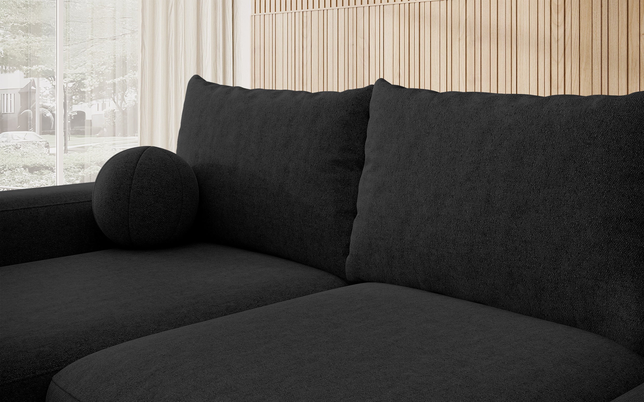 Ecksofa mit Schlafunktion Carnos L-förmig mit Ball, einzelne Kissen, schwarzer hydrophober Chenille, linksseitig