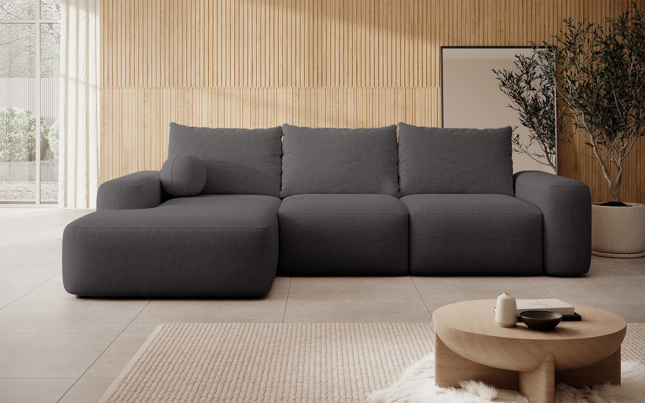 Ecksofa mit Schlaffunktion Carnos, L-förmig mit Ball, einzelne Kissen, dunkelgrauer hydrophober Chenille, linksseitig
