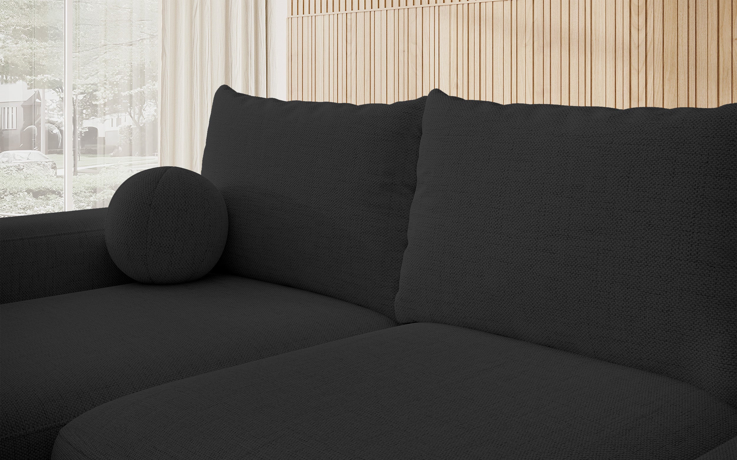 Ecksofa mit Schlafunktion Carnos L-förmig mit Ball, einzelne Kissen, schwarzer hydrophober Chenille, linksseitig
