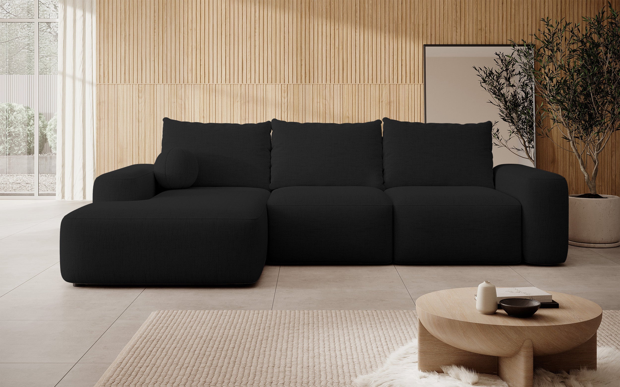Ecksofa mit Schlafunktion Carnos L-förmig mit Ball, einzelne Kissen, schwarzer hydrophober Chenille, linksseitig