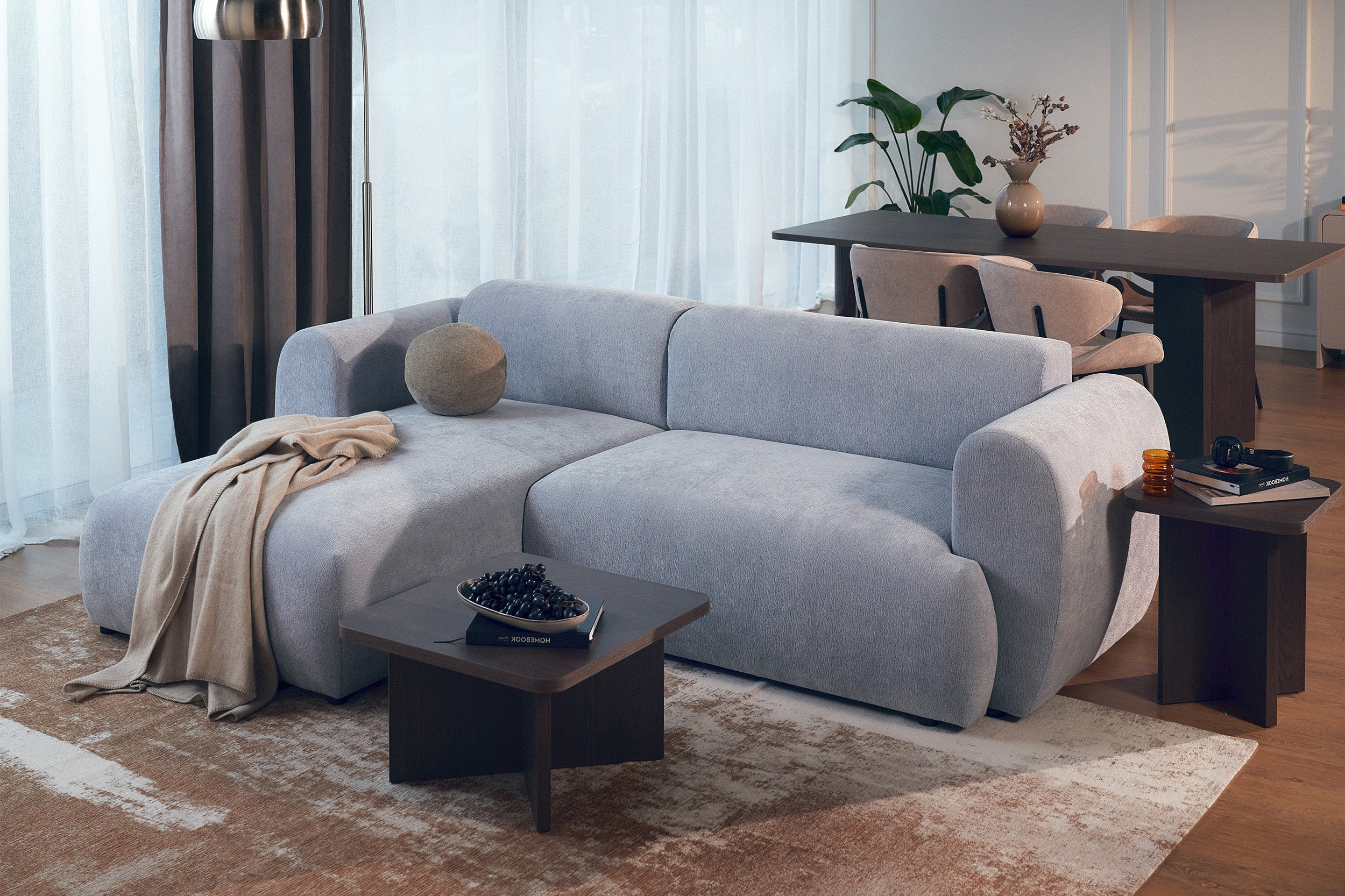 Ecksofa mit Schlaffunktion Emia, L-förmig, linksseitig, hellblauer Chenille-Bezug