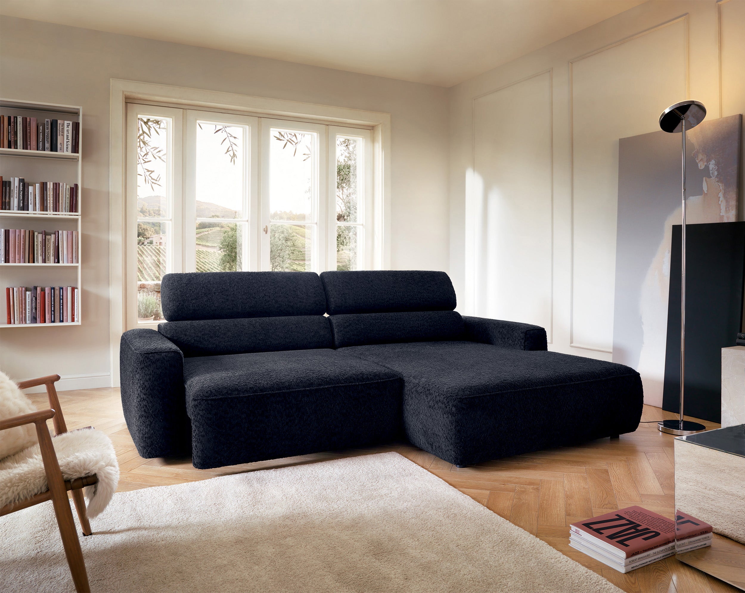 Ecksofa Fando mit elektrisch ausziehbarer Sitzfläche, L-förmig, rechtsseitig, marineblauer Chenille-Stoff