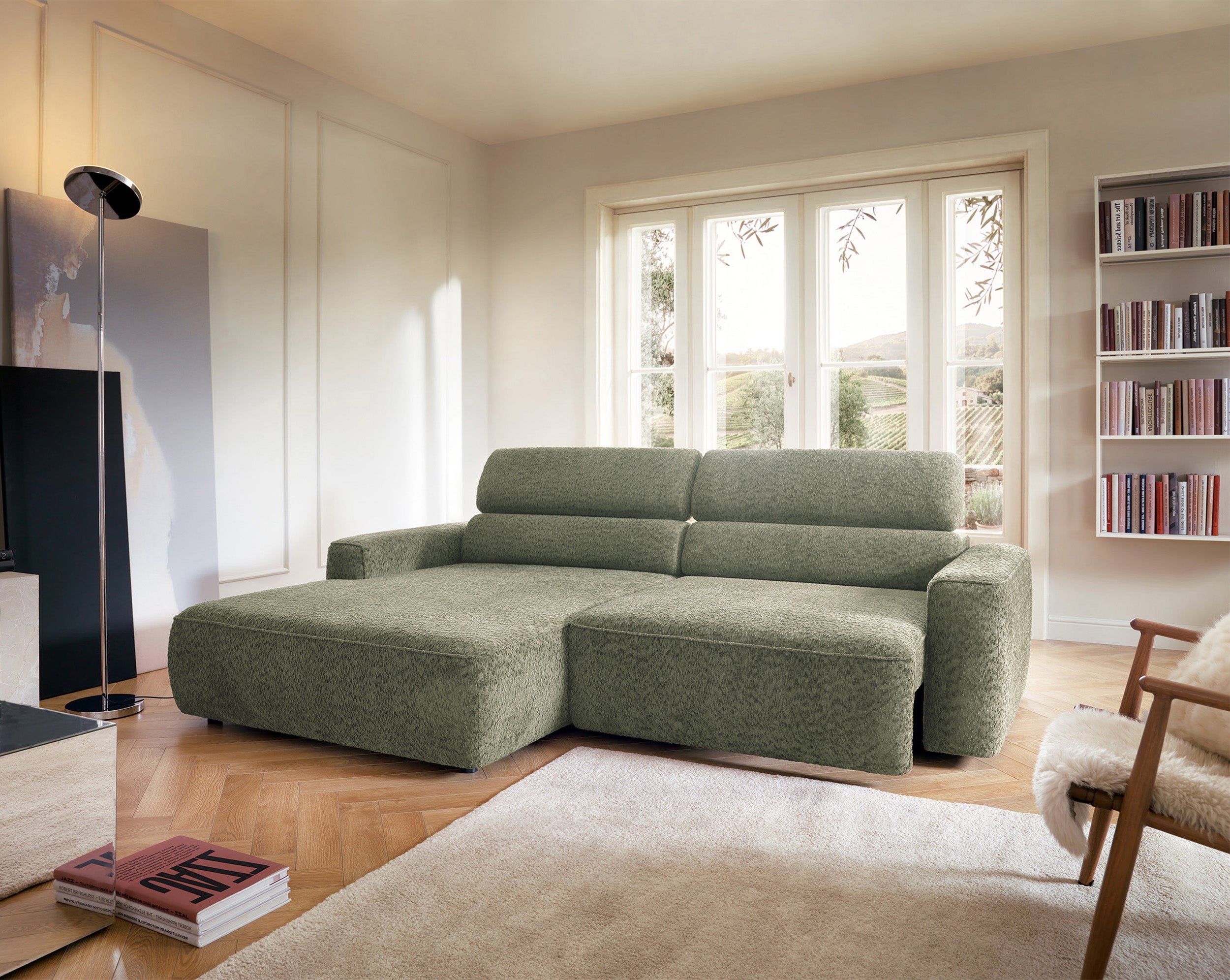 Ecksofa Fando mit elektrisch ausziehbarer Sitzfläche, L-förmig, linksseitig, salbeigrüner Chenillestoff