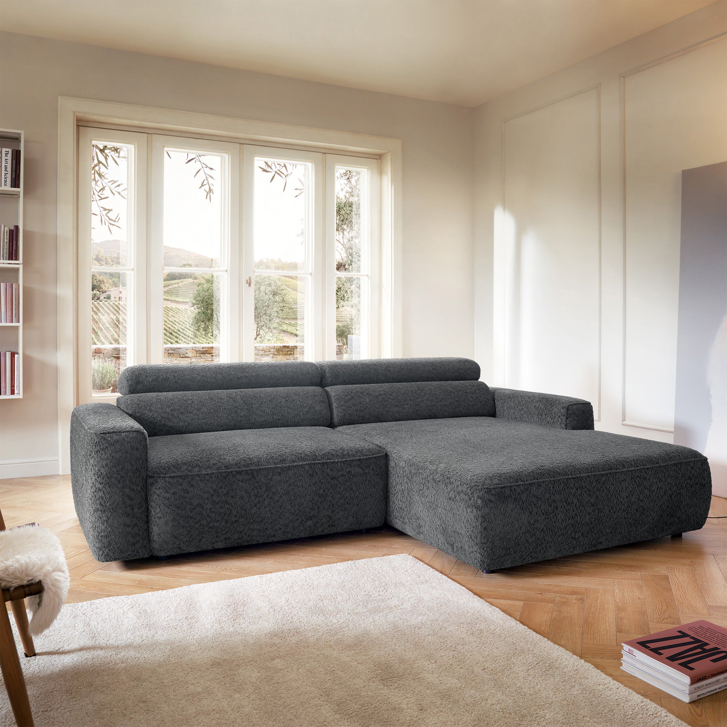 Ecksofa Fando mit elektrisch ausziehbarer Sitzfläche, L-förmig, rechtsseitig, dunkelgrauer Chenille-Stoff