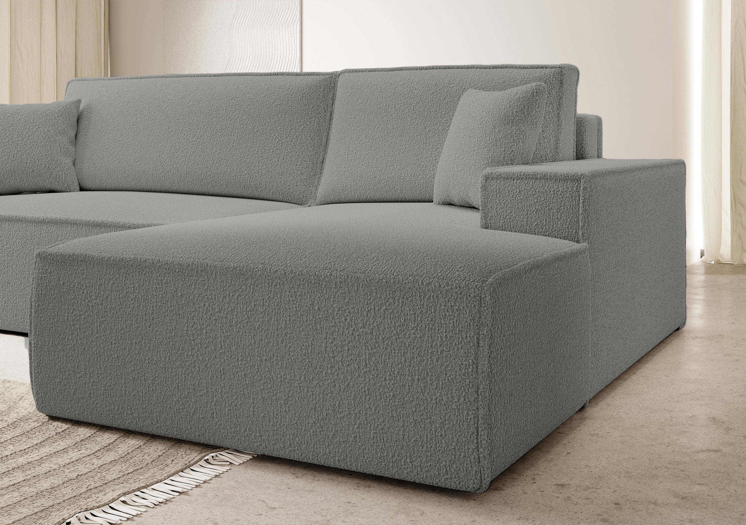 Ecksofa mit Schlaffunktion Farese New L-förmig mit Stauraum, grauer Bouclé, rechtsseitig