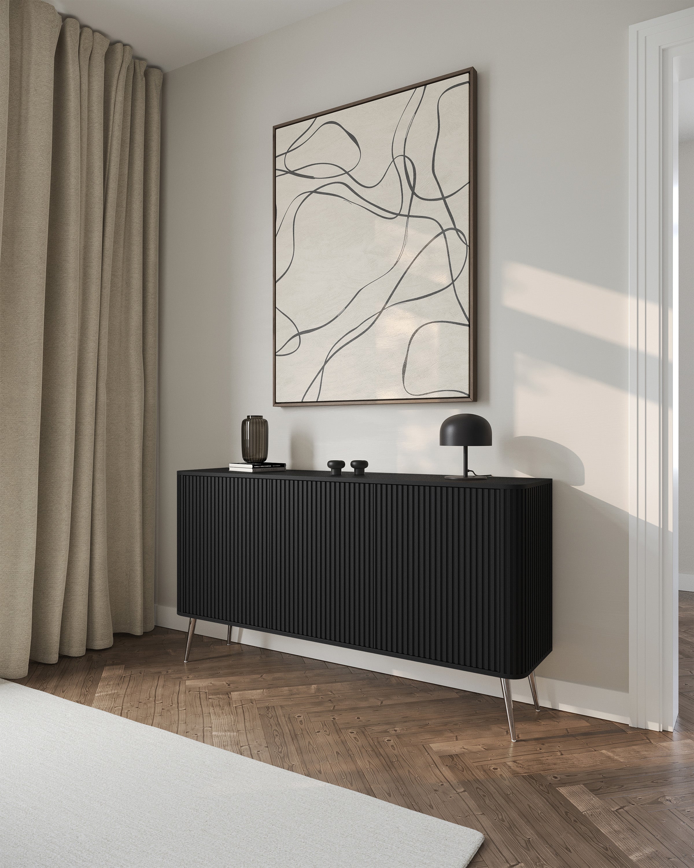 Kommode Ovarlo mit drei Türen, 163 cm, schwarz mit silbernen Beinen