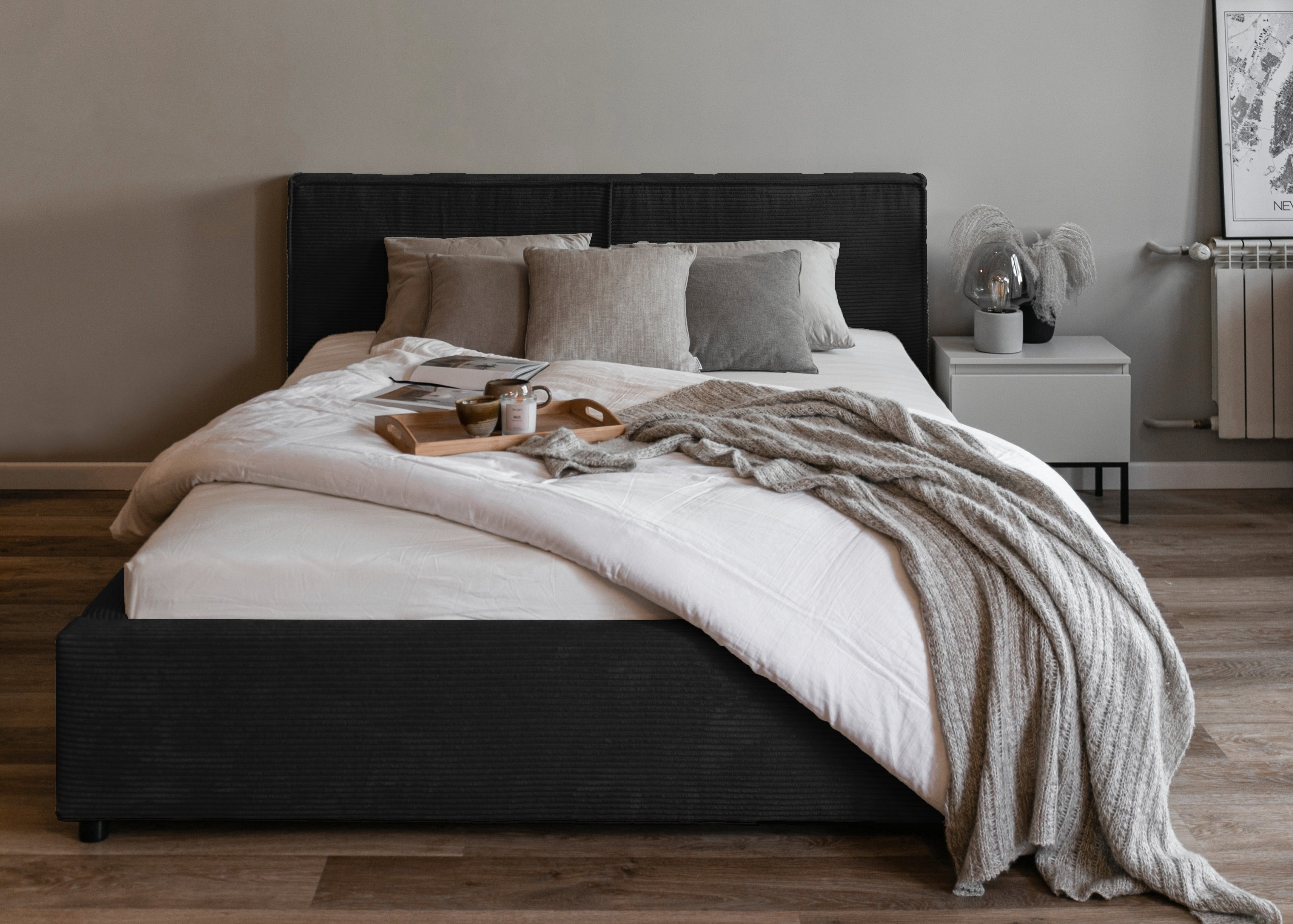 Polsterbett 180x200 cm Farese mit Stauraum und Gasdruckfeder, schwarz Cord