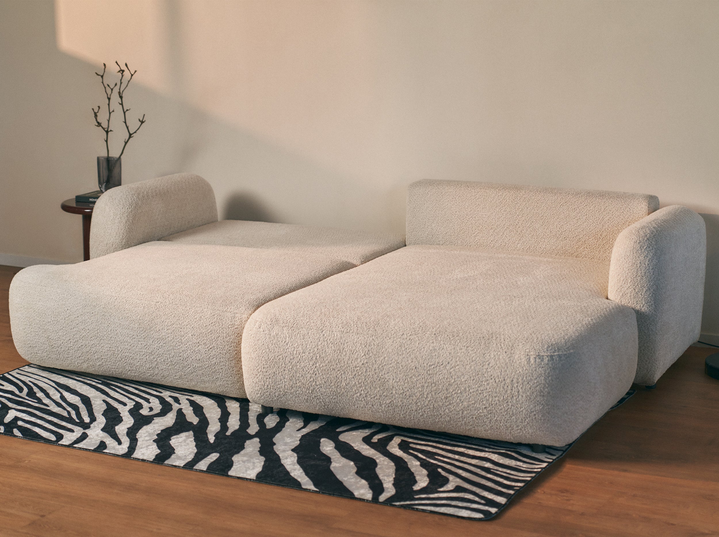 Ecksofa mit Schlaffunktion Tvoya, L-förmig, rechtsseitig, hellbeige Bouclé