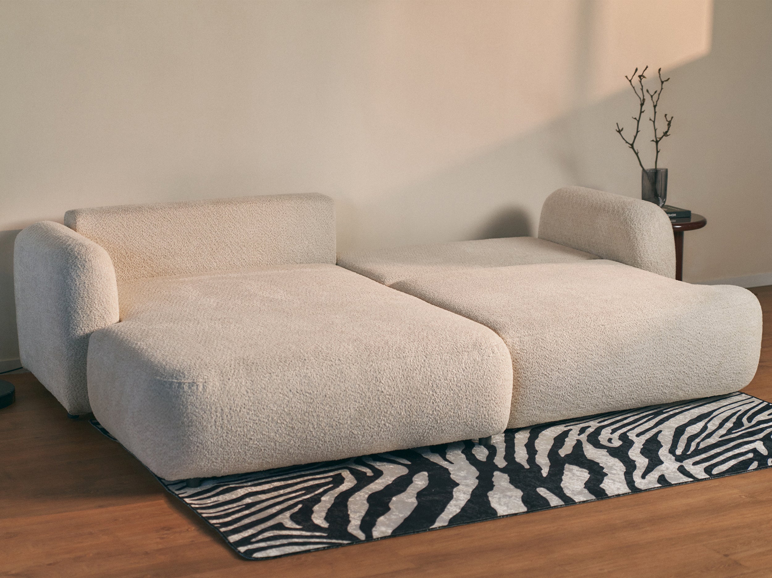 Ecksofa mit Schlaffunktion Tvoya, L-förmig, linksseitig, hellbeige Bouclé