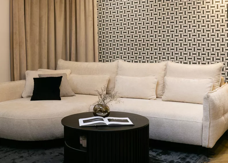 Ecksofa Oblivio mit Schlafunktion L-förmig mit Stauraum cremefarbener Chenille linksseitig